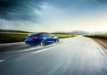 Should You Buy Tesla Stock Before April 22? The Answer Might Surprise You.: https://g.foolcdn.com/editorial/images/865462/a-tesla-car-driving-fast-through-the-rain-on-an-open-road.jpg