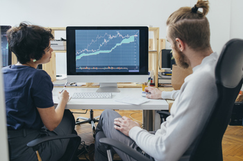 Better Crypto Buy Right Now: Ethereum vs. Solana: https://g.foolcdn.com/editorial/images/862839/two-traders-looking-at-a-chart.jpg