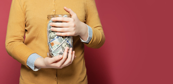 These 3 Dividend Stocks Are as Close to a Sure Thing as Investing Gets: https://g.foolcdn.com/editorial/images/862954/saving-money-in-a-jar.jpg
