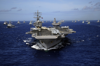 3 Defense Stocks to Buy in April: https://g.foolcdn.com/editorial/images/865083/carrier-strike-group-spearheaded-by-uss-ronald-reagan-at-sea.jpg