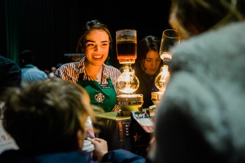 This Is the 1 Most Important Thing to Watch When Starbucks Reports Earnings on April 28: https://g.foolcdn.com/editorial/images/866510/person-giving-out-starbucks-coffee.jpg
