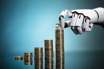 The Dow Is Down While the Nasdaq-100 Soars. Blame the Chips.: https://g.foolcdn.com/editorial/images/867195/ai-robot-hand-building-coin-stacks.jpg