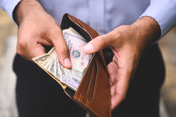 Should You Buy SCHD at $31 or Wait for a Better Entry Point?: https://g.foolcdn.com/editorial/images/866907/cash-in-wallet-2023.jpg