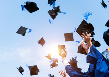Why Stride Stock Topped the Market Today: https://g.foolcdn.com/editorial/images/867771/graduation-caps-flying-into-the-air-after-being-tossed.jpg