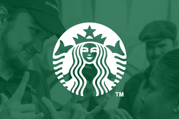 Why Starbucks Stock Popped Wednesday Morning: https://g.foolcdn.com/editorial/images/867723/the-starbucks-logo-superimposed-over-an-image-of-a-barista-interacting-with-a-customer.png