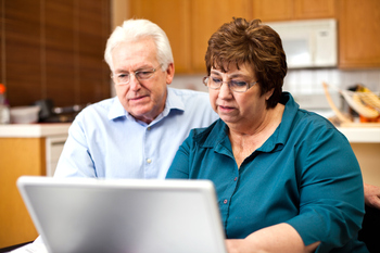 2 Signs You May Be Closer to Running Out of Money in Retirement Than You Think: https://g.foolcdn.com/editorial/images/867344/senior-couple-serious-at-laptop-gettyimages-184985143.jpg