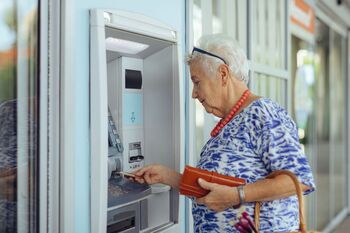 Want to Collect a High Dividend Every Month? Invest in These 3 Stocks: https://g.foolcdn.com/editorial/images/868424/a-person-withdrawing-money-from-an-atm.jpg