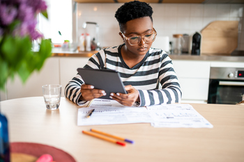 BlackRock CEO Larry Fink Is Demanding Crypto Regulations. Here's What It Means for Investors.: https://g.foolcdn.com/editorial/images/868732/investors-considers-papers-on-a-table-while-holding-a-tablet.jpg
