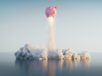 These 2 High-Yield Dividend Stocks Are on Track to Become Dividend Kings Next Year. Here's the Better Buy in May.: https://g.foolcdn.com/editorial/images/868821/a-piggy-bank-emits-a-plume-of-smoke-as-it-rockets-into-the-sky.jpg
