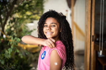 Why CVS Stock Topped the Market on Tuesday: https://g.foolcdn.com/editorial/images/869703/person-smiling-while-showing-off-fresh-vaccine-shot.jpg