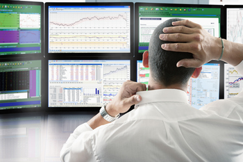 Boxes, Subscriptions, and Beyond: The Evolution of Software Pricing: https://g.foolcdn.com/editorial/images/869568/investor-looking-at-many-screens-of-financial-data.jpg
