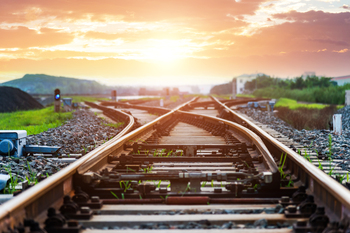 Union Pacific vs. CSX: Better Railroad Stock in 2026?: https://g.foolcdn.com/editorial/images/867737/railroad-crossing.jpg
