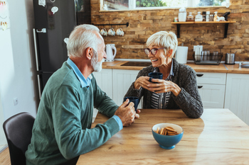4 Costs of Yours That Might Increase in Retirement: https://g.foolcdn.com/editorial/images/854291/senior-couple-kitchen-table-gettyimages-1066987658.jpg
