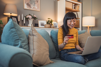 Will Taking Over Apple's Credit Card Business Boost JPMorgan Chase Stock?: https://g.foolcdn.com/editorial/images/850293/person-holding-payment-card-while-using-a-laptop-pc.jpg