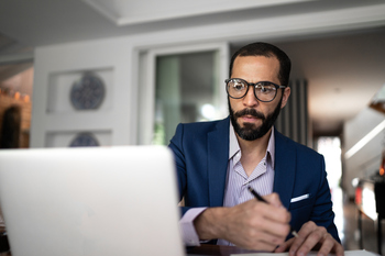You May Not Be Behind on Retirement Savings -- But There's Still Cause for Concern: https://g.foolcdn.com/editorial/images/854709/serious-person-staring-at-laptop-and-writing-note.jpg