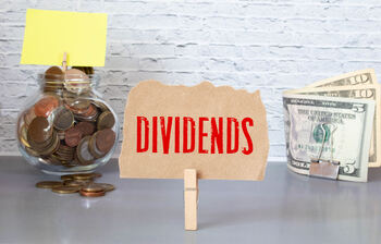 3 Top Dow Jones Dividend Stocks to Buy for Passive Income in 2026: https://g.foolcdn.com/editorial/images/850469/dividend-sign.jpg