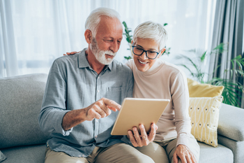 3 Questions to Ask Yourself Before Relocating in Retirement: https://g.foolcdn.com/editorial/images/854497/senior-couple-looking-at-tablet_gettyimages-1290880253.jpg