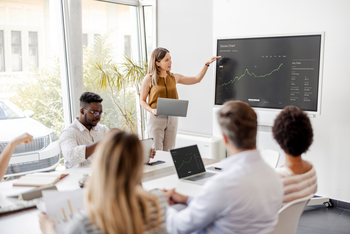 Key Takeaways From USA Rare Earth's Big Deal: https://g.foolcdn.com/editorial/images/854722/investor-examines-stock-chart-during-group-presentation.jpg