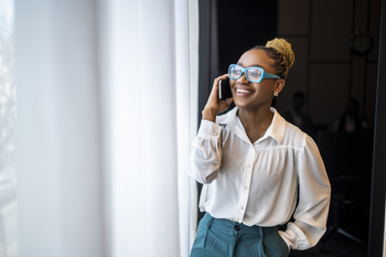 Meta Platforms Is Preparing for AI's "iPhone Moment": Is the Stock a Buy?: https://g.foolcdn.com/editorial/images/854202/person-wearing-glasses-and-talking-on-the-phone.jpg
