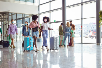 Why TripAdvisor Stock Was Diving on Thursday: https://g.foolcdn.com/editorial/images/856238/two-travelers-moving-through-an-airport-corridor.jpg