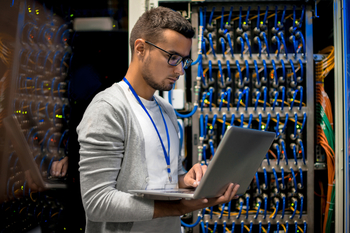 Amazon, Microsoft, and Alphabet Stocks Plummet on AI Investments. These 3 Stocks Are Set to Win.: https://g.foolcdn.com/editorial/images/855383/a-person-with-a-laptop-in-a-technology-lab.jpg