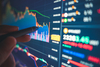 Why Bullish Stock Is Bolting Higher This Week: https://g.foolcdn.com/editorial/images/856334/investor-points-stylus-at-digital-financial-chart.jpg