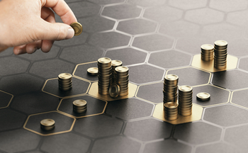 Why Starting Small Works: How a 1% Starter Position Can Build Big Gains Over Time: https://g.foolcdn.com/editorial/images/855359/24_12_30-a-hand-placing-piles-of-coins-on-a-grid-_mf-dload-gettyimages-1283813790-1201x742-1536a11.jpg