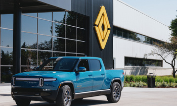 Where Will Rivian Be in 3 Years?: https://g.foolcdn.com/editorial/images/855137/truck-in-front-of-building-with-_rivian-logo_rivian.jpg
