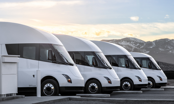 Tesla Makes Its Largest Investment Bet Yet in Its Own Vision: https://g.foolcdn.com/editorial/images/856128/line-of-tesla-semi-trucks.png