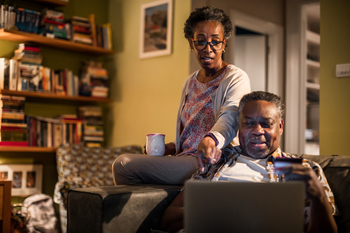 3 Rules All Retirees Must Know About Working While Collecting Social Security: https://g.foolcdn.com/editorial/images/855472/couple-looking-at-computer-together.jpg
