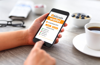 Bitcoin vs. iShares Bitcoin Trust: The Better Investment for 2026 and Beyond: https://g.foolcdn.com/editorial/images/856115/looking-at-bitcoin-wallet-on-smartphone-app.jpg