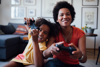 The Smartest Growth Stocks to Buy With $100 Right Now: https://g.foolcdn.com/editorial/images/856035/family-playing-video-games.jpg