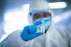 Why Moderna Stock Just Popped: https://g.foolcdn.com/editorial/images/856852/chinese-doctor-in-clean-suit-examining-a-capped-bottle-of-vaccine.jpg