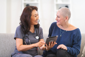 What Is One of the Best Healthcare Stocks to Own for the Next 10 Years?: https://g.foolcdn.com/editorial/images/855684/cancer-patient-consultation-home-visit.jpg