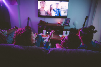 Down Nearly 40% From Its All-Time High, Is Netflix Stock Too Cheap to Ignore?: https://g.foolcdn.com/editorial/images/856282/group-of-teens-watching-tv.jpg