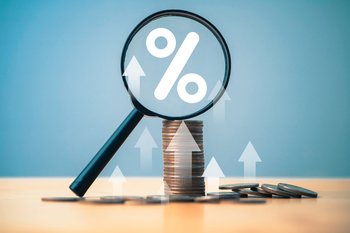 Better Dividend Stock: Energy Transfer vs. Enterprise Products Partners in 2026: https://g.foolcdn.com/editorial/images/856089/coins-with-a-magnifying-glass-and-a-percent-sign.jpg
