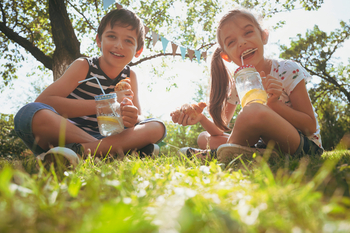 Should You Forget Berkshire Hathaway Stock and Buy Lemonade Stock Instead?: https://g.foolcdn.com/editorial/images/856319/2-children-drinking-water.jpg