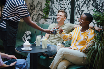 Here's How Fiserv Stock Beats the Market From Here: https://g.foolcdn.com/editorial/images/855409/people-paying-at-a-restaurant.jpg