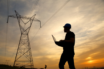 These 2 Energy Stocks Are Helping Solve AI's Biggest Pressure Point: https://g.foolcdn.com/editorial/images/857524/a-person-wearing-a-hardhat-and-holding-a-laptop-near-a-power-line.jpg