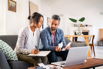 Does Your 401(k) Balance Beat the Average?: https://g.foolcdn.com/editorial/images/849744/adult-couple-working-in-finances-with-receipt.jpg