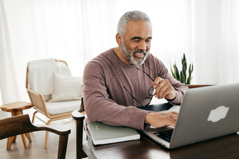 Social Security: Research Shows These Are the Best (and Worst) Ages to File for Benefits: https://g.foolcdn.com/editorial/images/857612/person-using-a-laptop-and-smiling-copy.jpg