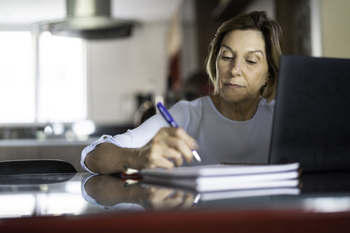 You Only Have Until March 31 to Make This Crucial Medicare Move: https://g.foolcdn.com/editorial/images/857438/older-woman-taking-notes-laptop-gettyimages-1143057831.jpg
