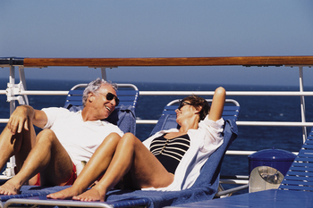Is Royal Caribbean Stock a Buy, Sell, or Hold in 2026?: https://g.foolcdn.com/editorial/images/857195/a-couple-relaxing-while-on-a-cruise.jpg