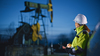 Occidental Petroleum: Buy, Sell, or Hold?: https://g.foolcdn.com/editorial/images/857218/oil-worker-with-pumpjack-in-background-getty.jpg