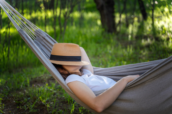 Carroll County, New Hampshire, Might Be the Northeast's Most Peaceful Retirement Escape: https://g.foolcdn.com/editorial/images/852989/24_07_15-a-person-sleeping-in-a-hammock-_mf-dload-gettyimages-1482788434-1200x800-5b2df79.jpg