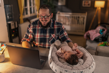 Can MercadoLibre Stock Get to $2,000?: https://g.foolcdn.com/editorial/images/858014/father-with-a-baby-while-hes-on-the-computer.jpg