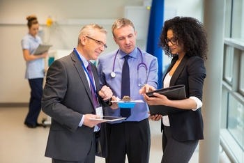 UnitedHealth's Stock Might Not Rally Until This Number Improves: https://g.foolcdn.com/editorial/images/858306/doctor-discussing-a-report-with-people.jpg