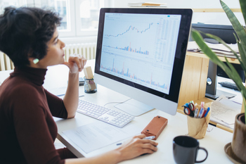 Why Broadcom Stock Sank Today: https://g.foolcdn.com/editorial/images/858796/person-at-a-work-desk-studying-something-on-a-pc-monitor.jpg