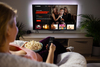 1 Reason Netflix Could Have a Big March: https://g.foolcdn.com/editorial/images/858295/netflixwatching.jpg