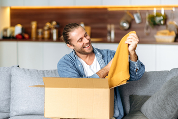 3 Things to Know About Etsy Stock Before You Buy: https://g.foolcdn.com/editorial/images/858364/open-box-online-order-clothes.jpg